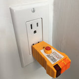 GFCI Outlet Circuit Tester Plugged into Outlet